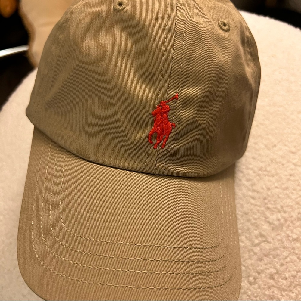 SOLDD!!!!
Polo Ralph Lauren Tan Cap with Orange Logo